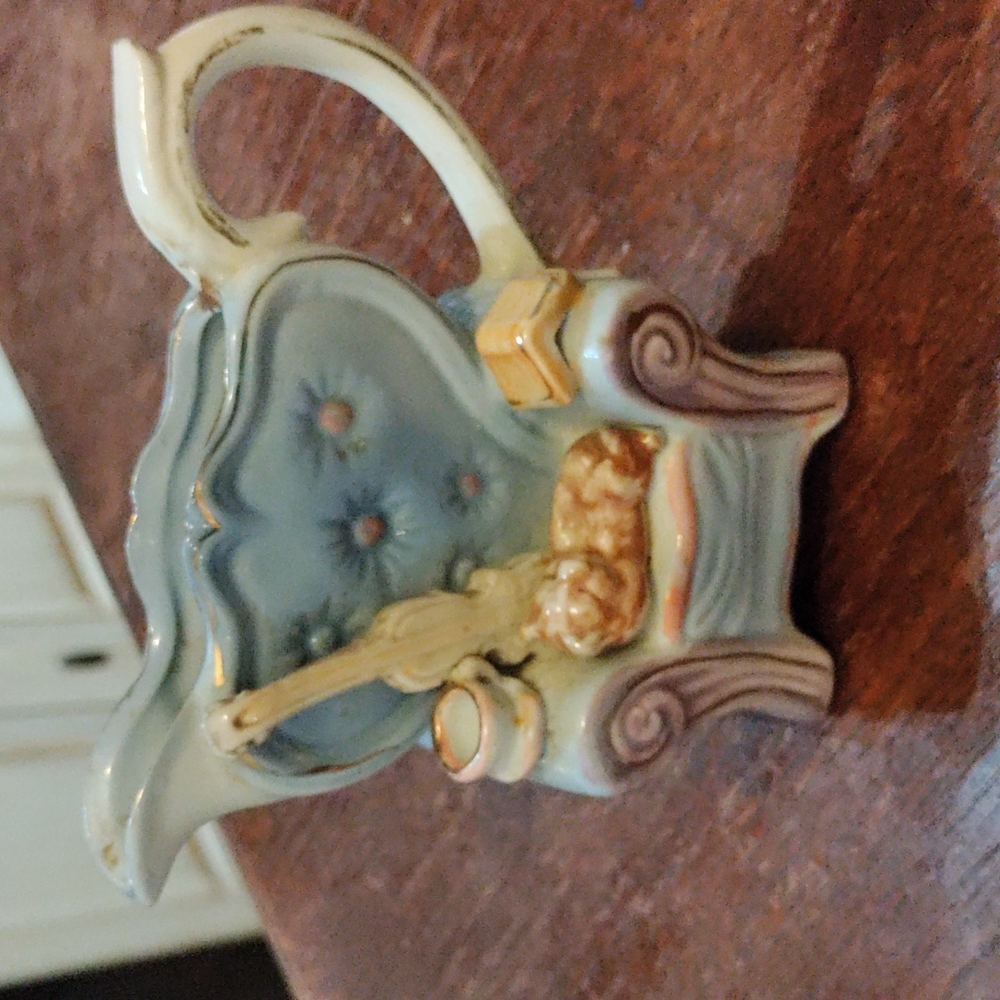 Vintage arm chair pitcher